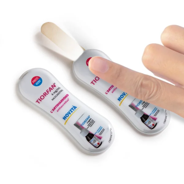 Gagdet per medici Porta Abbassalingua personalizzato con torcetta esempio tiorfan. Gadget per l'ispezione del cavo orale